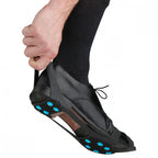 nordic ice grip snow shoes grip shown as worn on regular leather shoes