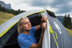 coleman darwin 3 tent door opepend by a person