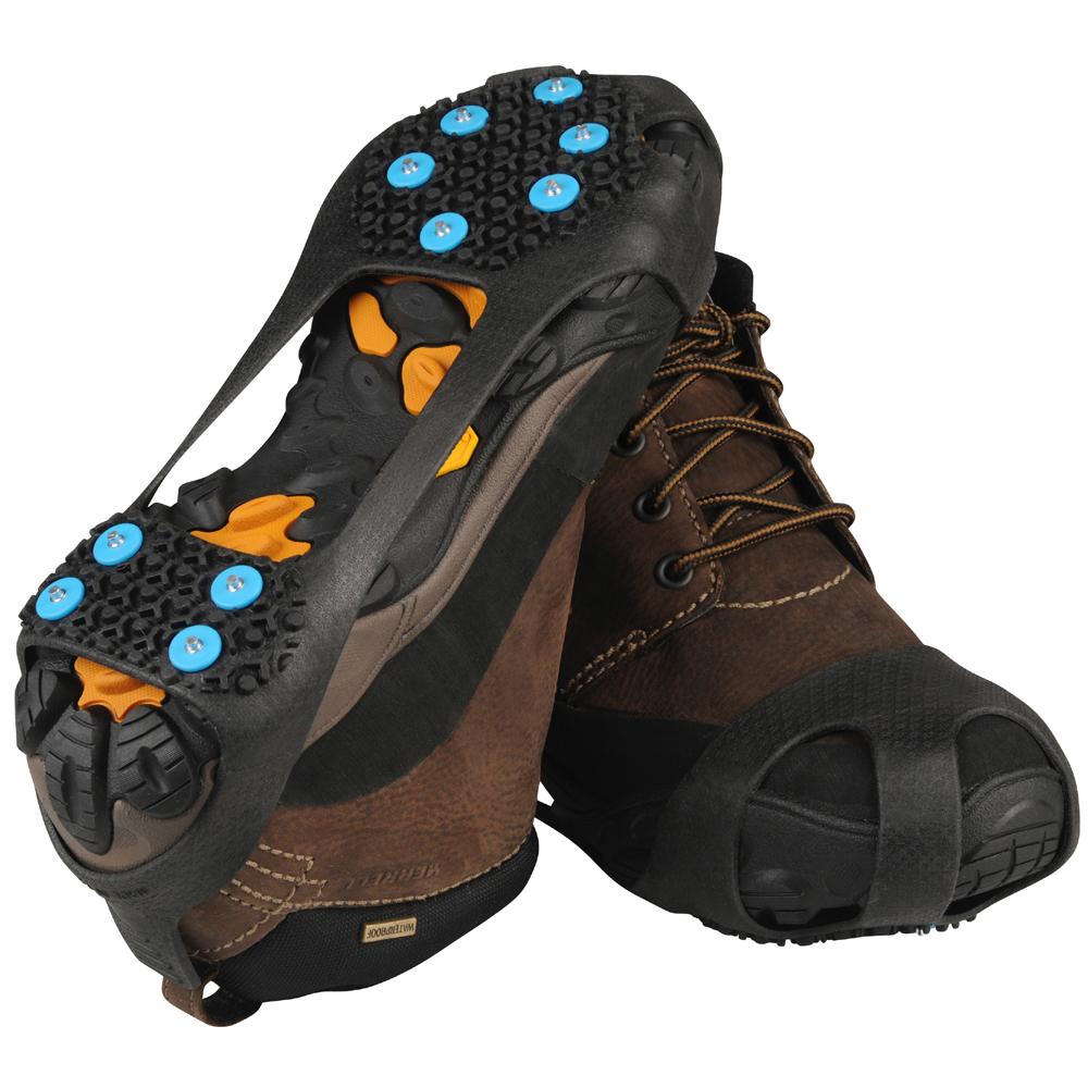 nordic ice grip rubber snow grip with metal spikes for shoes shown worn on the shoes